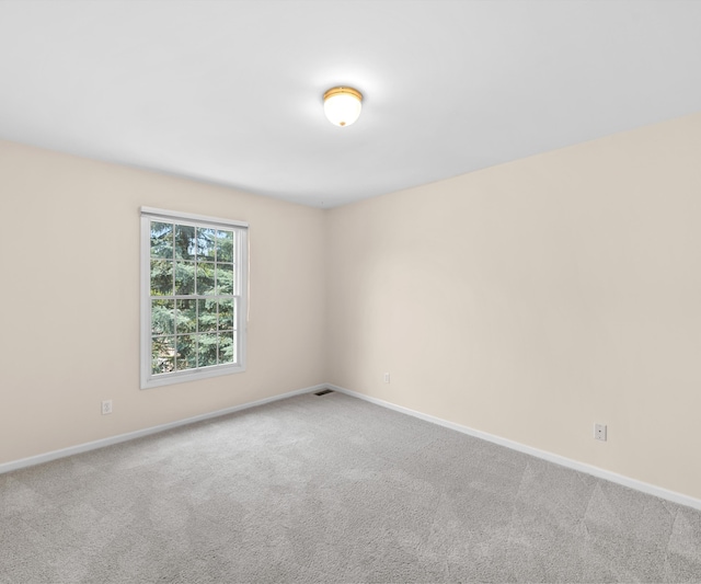 668 Boston Ct, Ann Arbor, MI 48103 - carpeted spare room with baseboards