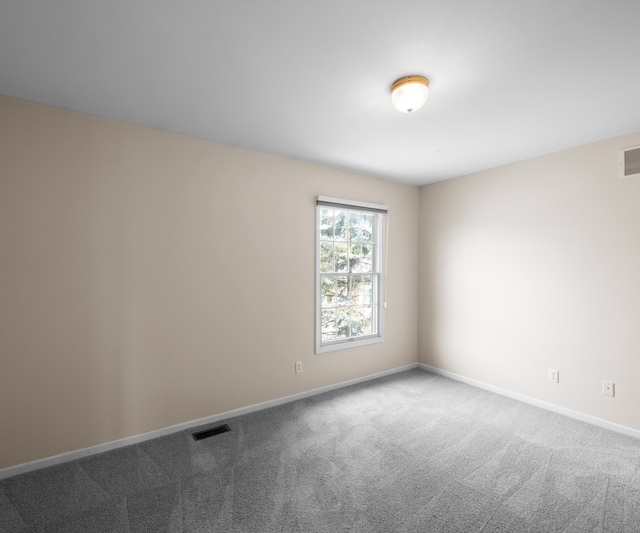 668 Boston Ct, Ann Arbor, MI 48103 - spare room with carpet