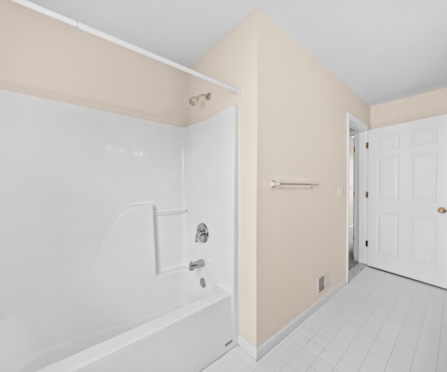 668 Boston Ct, Ann Arbor, MI 48103 - bathroom featuring tile patterned floors and  shower combination