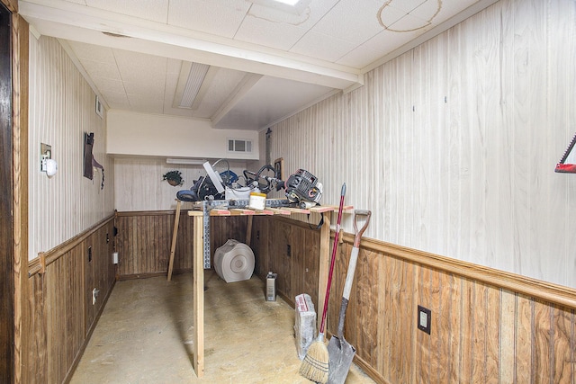 565 E Rockford Rd, Idlewild, MI 49642 - basement featuring wood walls and wainscoting