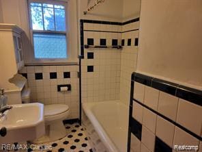 17951 Prospect St, Dearborn Heights, MI 48122 - full bath with tile walls, a bathtub, tile patterned flooring, and a shower