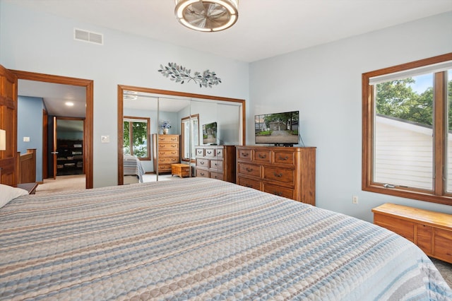5090 Schrah Dr, Munith, MI 49259 - bedroom with light colored carpet and a closet