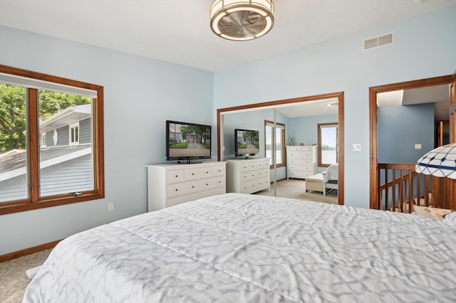5090 Schrah Dr, Munith, MI 49259 - carpeted bedroom with a closet and baseboards