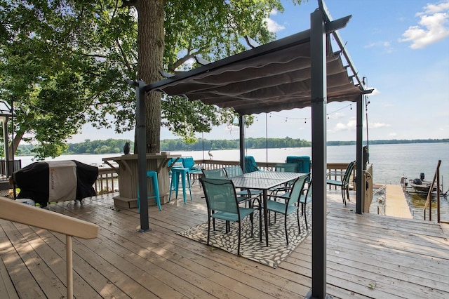 5090 Schrah Dr, Munith, MI 49259 - deck featuring a grill, a water view, and a boat dock