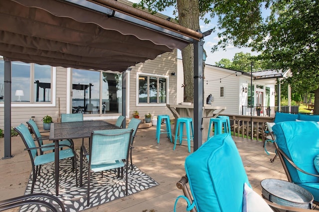 5090 Schrah Dr, Munith, MI 49259 - deck featuring outdoor dining space