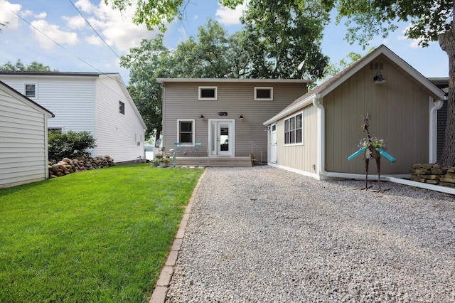 5090 Schrah Dr, Munith, MI 49259 - view of front of home with a front lawn