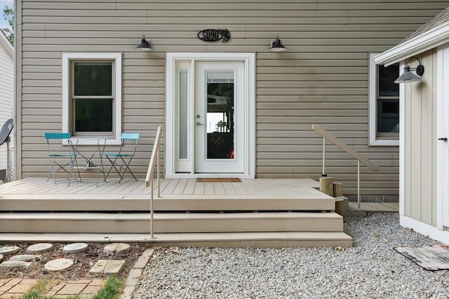 5090 Schrah Dr, Munith, MI 49259 - entrance to property with a deck