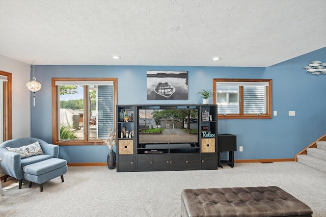 5090 Schrah Dr, Munith, MI 49259 - living room featuring carpet, a textured ceiling, recessed lighting, and stairway