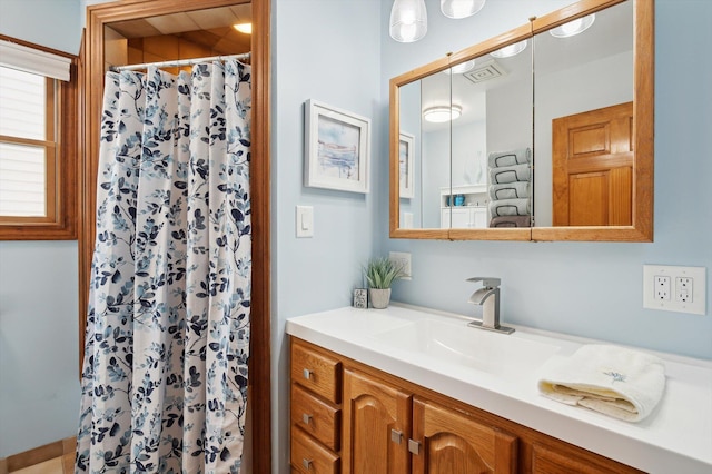 5090 Schrah Dr, Munith, MI 49259 - full bath with vanity and a shower with curtain