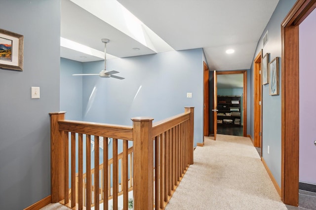 5090 Schrah Dr, Munith, MI 49259 - hall featuring an upstairs landing, carpet, and recessed lighting