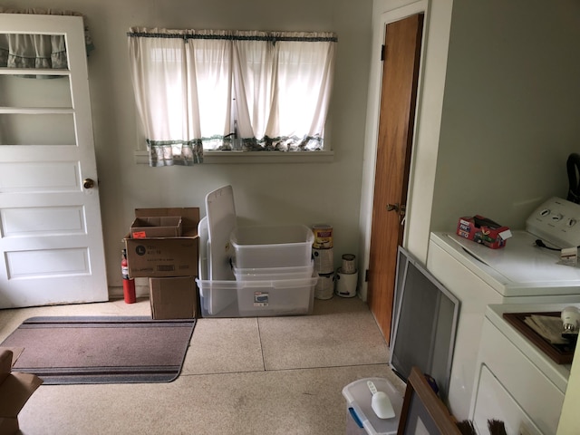 1483 Rose Ave, Benton Harbor, MI 49022 - washroom with washer and clothes dryer