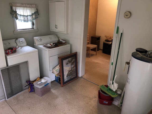 1483 Rose Ave, Benton Harbor, MI 49022 - laundry area with water heater, washer and clothes dryer, cabinet space, and light carpet