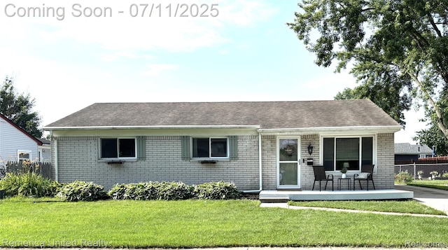 38625 Northampton St, Westland, MI 48186 - view of front of home with brick siding and roof with shingles