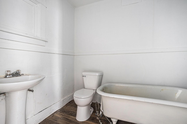 174 Cherry St, Battle Creek, MI 49017 - full bathroom with a soaking tub and wood finished floors