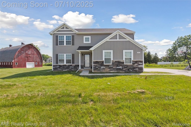 7057 Primrose Ln, Grand Blanc, MI 48439 - view of front facade with a barn, stone siding, an outdoor structure, a front lawn, and a garage