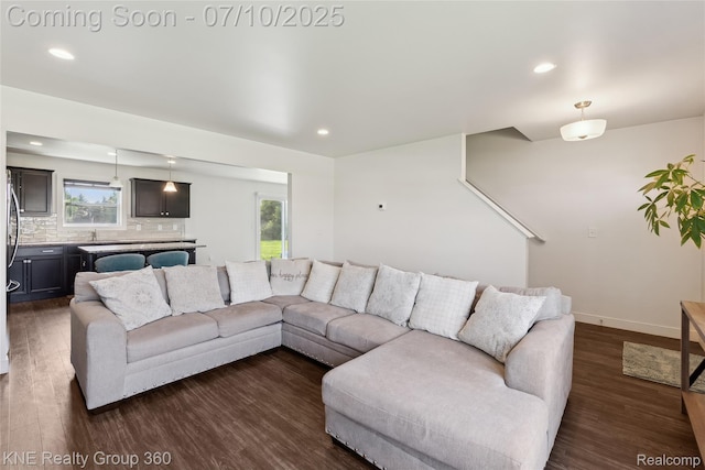 7057 Primrose Ln, Grand Blanc, MI 48439 - living room with dark wood finished floors, recessed lighting, and healthy amount of natural light