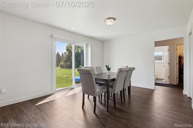 7057 Primrose Ln, Grand Blanc, MI 48439 - dining space with dark wood-type flooring and baseboards