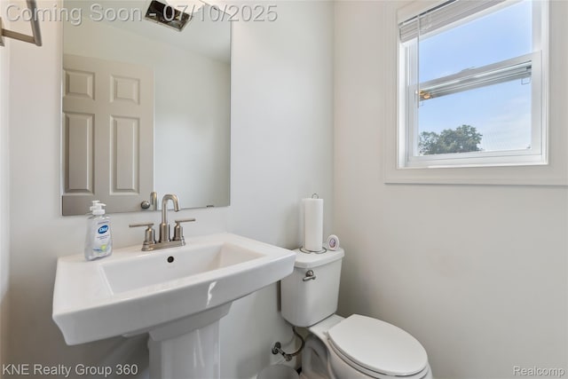 7057 Primrose Ln, Grand Blanc, MI 48439 - half bathroom featuring toilet and a sink