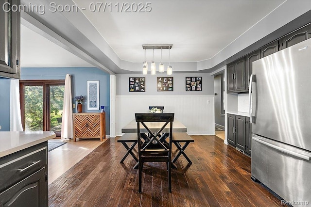 4674 Chapel Dr, Troy, MI 48085 - dining room featuring dark wood finished floors and a wainscoted wall