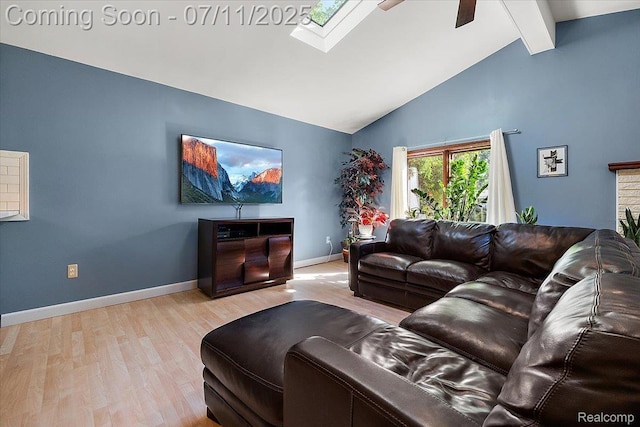 4674 Chapel Dr, Troy, MI 48085 - living area with wood finished floors, beamed ceiling, a skylight, high vaulted ceiling, and a ceiling fan