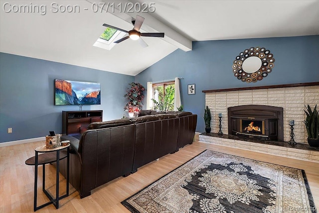 4674 Chapel Dr, Troy, MI 48085 - living room featuring a ceiling fan, light wood finished floors, and a skylight