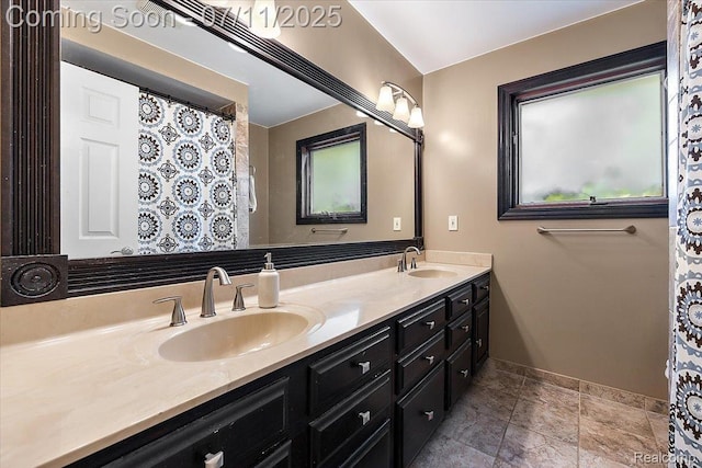 4674 Chapel Dr, Troy, MI 48085 - bathroom featuring baseboards and double vanity