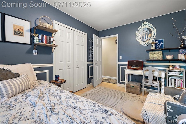 4674 Chapel Dr, Troy, MI 48085 - bedroom with wood finished floors and a closet