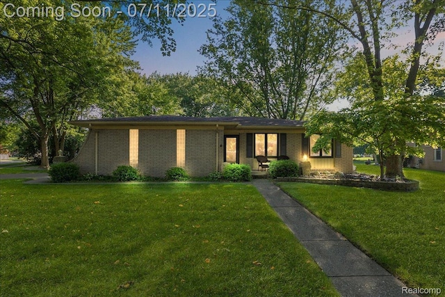 4674 Chapel Dr, Troy, MI 48085 - view of front of property featuring a front yard and brick siding