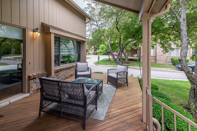 37516 N Laurel Park Dr, Livonia, MI 48152 - wooden terrace with an outdoor living space