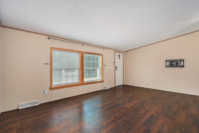 36466 M 40, Paw Paw, MI 49079 - spare room featuring wood finished floors, a textured ceiling, and ornamental molding