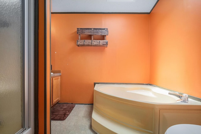 36466 M 40, Paw Paw, MI 49079 - bathroom featuring a bath, a shower stall, and vanity