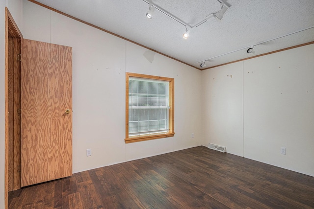 36466 M 40, Paw Paw, MI 49079 - empty room with crown molding, lofted ceiling, wood finished floors, track lighting, and attic access