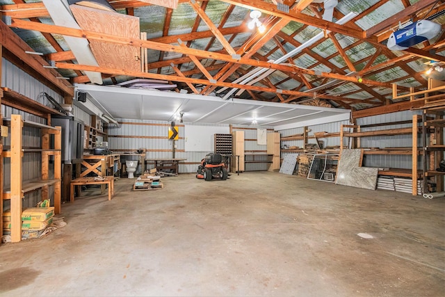 36466 M 40, Paw Paw, MI 49079 - garage featuring a garage door opener and a workshop area