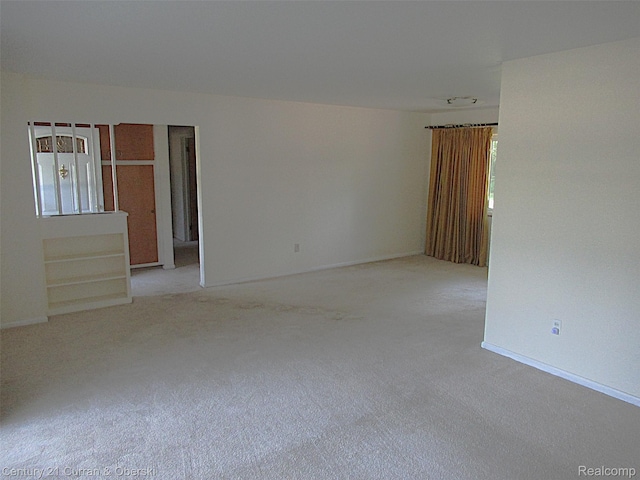 34005 Alta Loma Dr, Farmington, MI 48335 - carpeted spare room featuring baseboards