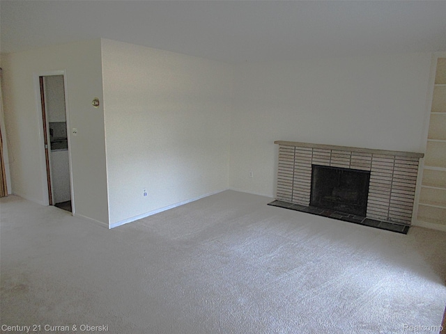 34005 Alta Loma Dr, Farmington, MI 48335 - unfurnished living room with carpet flooring and a fireplace