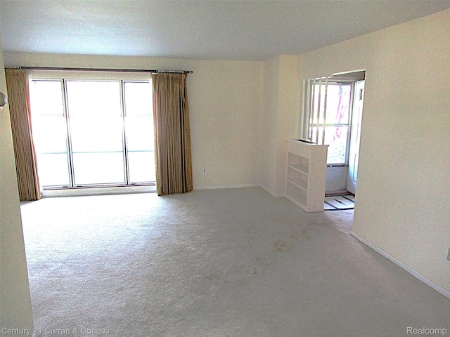 34005 Alta Loma Dr, Farmington, MI 48335 - unfurnished room with carpet floors and baseboards
