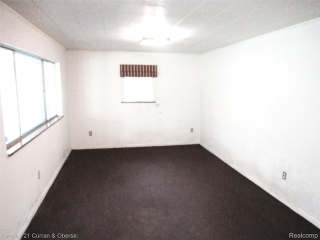 34005 Alta Loma Dr, Farmington, MI 48335 - spare room featuring healthy amount of natural light and carpet