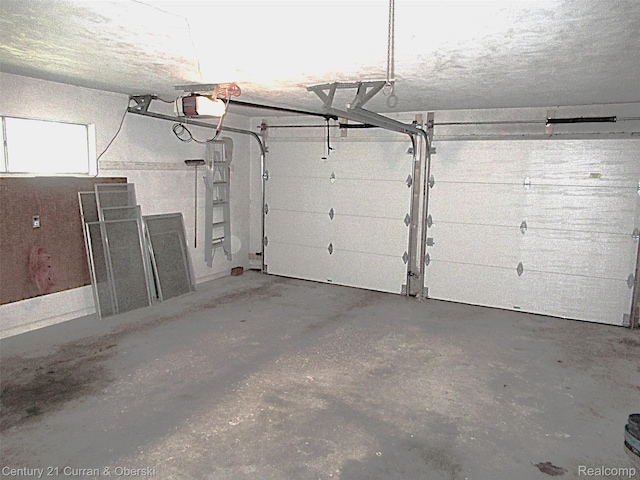 34005 Alta Loma Dr, Farmington, MI 48335 - garage featuring a garage door opener