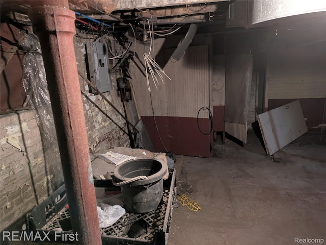 4342 Tyler St, Detroit, MI 48238 - unfinished basement featuring electric panel and concrete block wall
