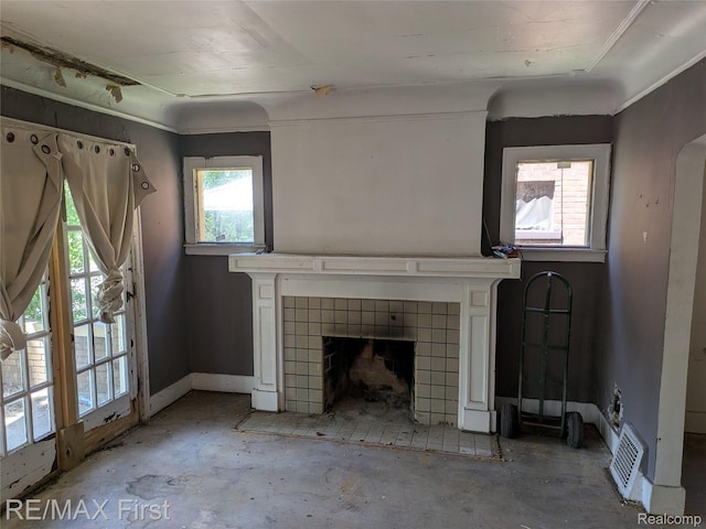 4342 Tyler St, Detroit, MI 48238 - unfurnished living room with a fireplace and baseboards