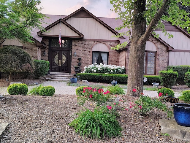 22770 Shadowglen Dr, Farmington Hills, MI 48335 - view of front facade with brick siding