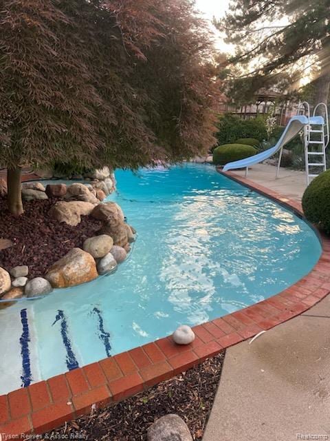 22770 Shadowglen Dr, Farmington Hills, MI 48335 - swimming pool with a water slide