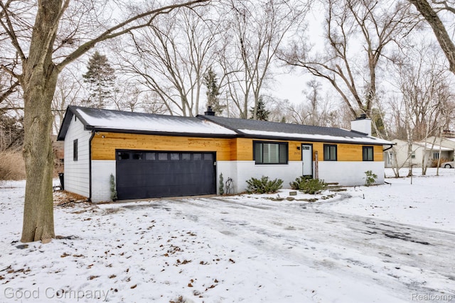 29755 Rosemond Dr, Southfield, MI 48025 - view of front of house featuring a chimney and an attached garage