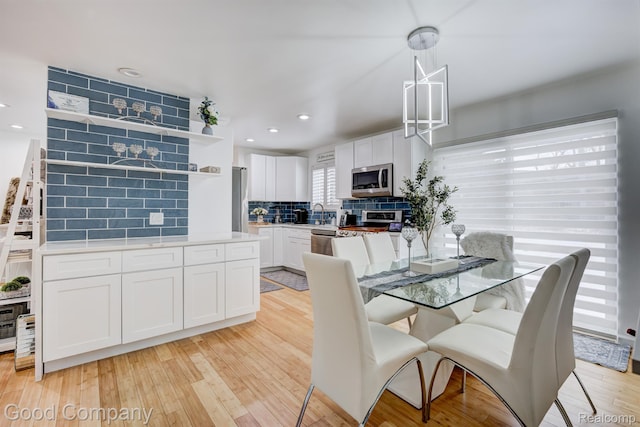 29755 Rosemond Dr, Southfield, MI 48025 - dining room with light wood-style floors and recessed lighting