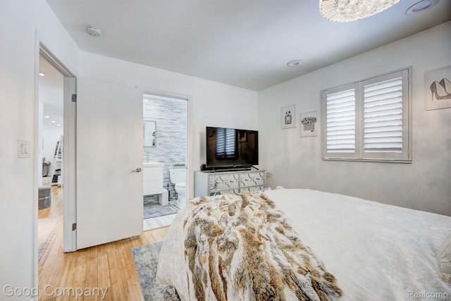 29755 Rosemond Dr, Southfield, MI 48025 - bedroom featuring wood finished floors and connected bathroom