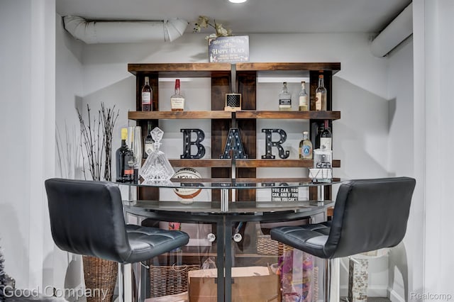 29755 Rosemond Dr, Southfield, MI 48025 - home office featuring a dry bar and baseboards