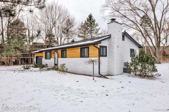 29755 Rosemond Dr, Southfield, MI 48025 - view of front of home featuring a chimney and a garage