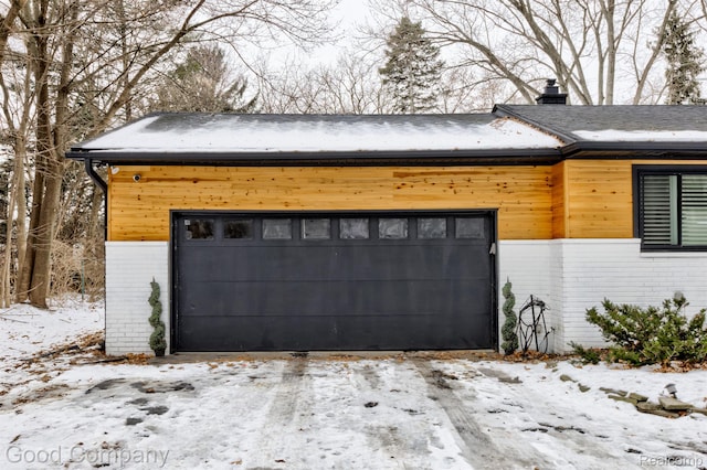 29755 Rosemond Dr, Southfield, MI 48025 - view of snow covered garage