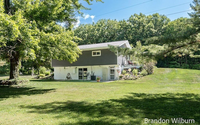 2289 S Sullivan Rd, Ravenna, MI 49451 - back of property with a yard