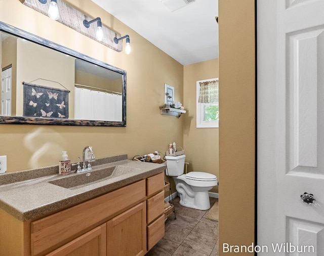 2289 S Sullivan Rd, Ravenna, MI 49451 - bathroom with vanity and tile patterned floors